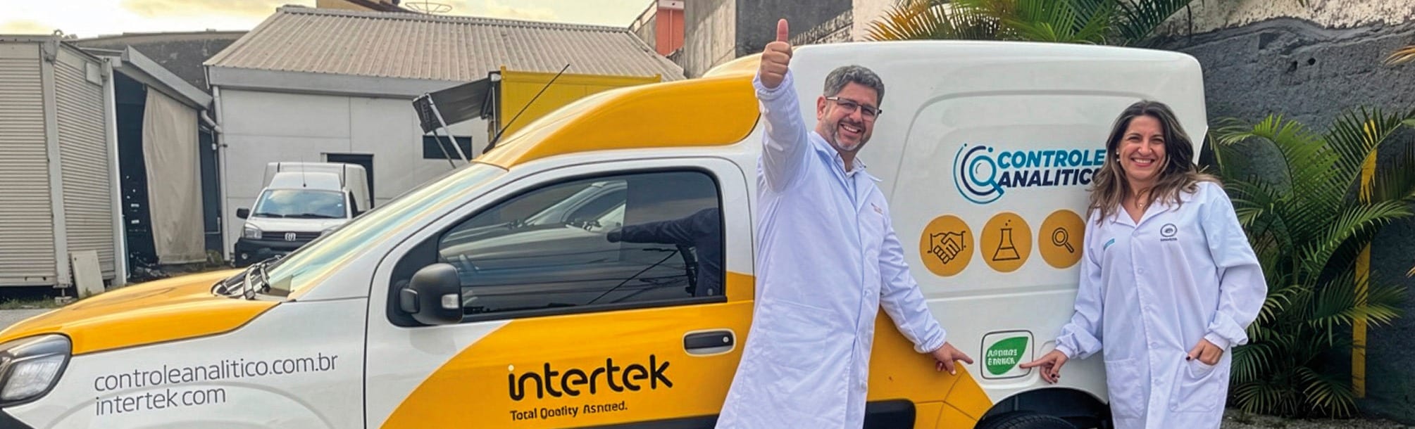 Intertek Ghana team poses with books collected for a school for blind children