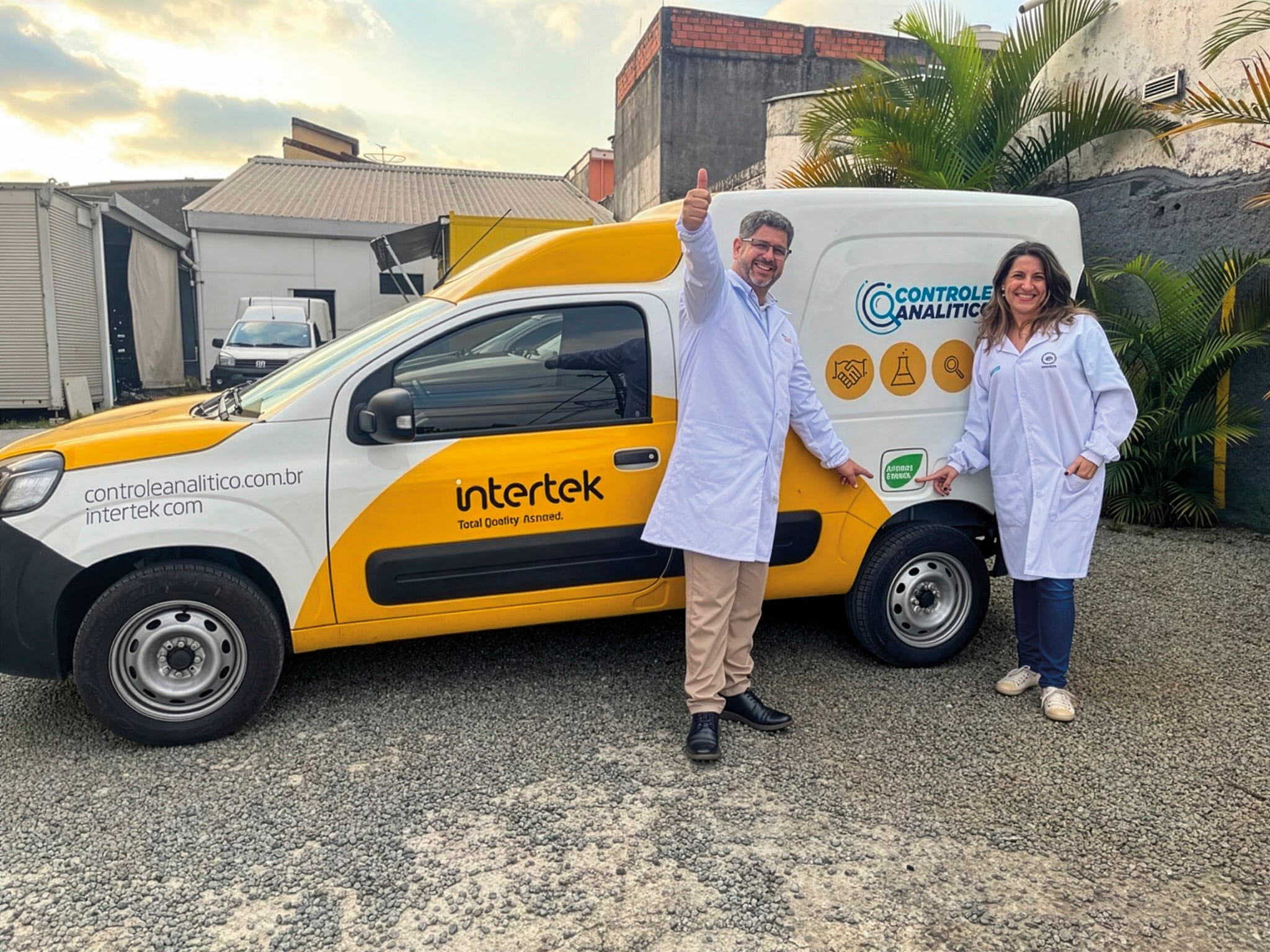 Intertek Ghana team poses with books collected for a school for blind children